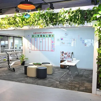 For the innovative team at Thoughtworks, we designed green installations that integrate seamlessly into their collaborative workspace. This living archway and vertical column utilize unused vertical space, acting as natural air purifiers and bringing the benefits of nature indoors.