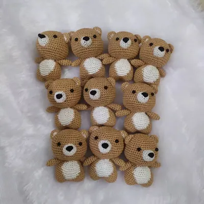 Ten little teddies all ready to go to their new home. I love making these in batches for parties. They are a sweet, handmade gift that guests will cherish.