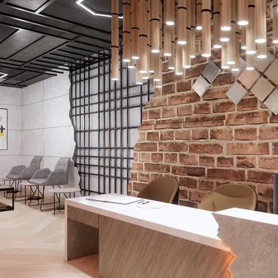 The reception and waiting area of The Fitness World Gym in Mathura. We used a mix of industrial and modern elements, including exposed brick, geometric lighting, and motivational posters, to create an energetic atmosphere.
