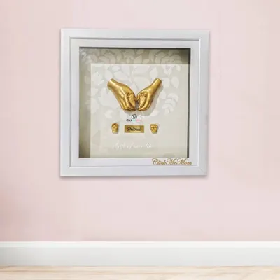 The ultimate expression of family love, captured in a single frame. This design features the parents' hands cradling their baby's tiny casted hands, creating a powerful 3D sculpture that symbolizes your family's bond.
