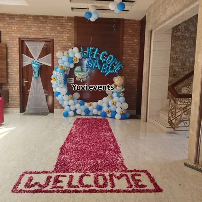 For this 'Welcome Baby' event, I created a grand entrance with a long carpet made entirely of red rose petals.
