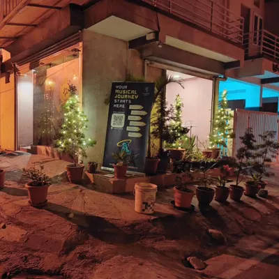 An evening at our academy in Koramangala. The lights are on, and the music is always ready to play.