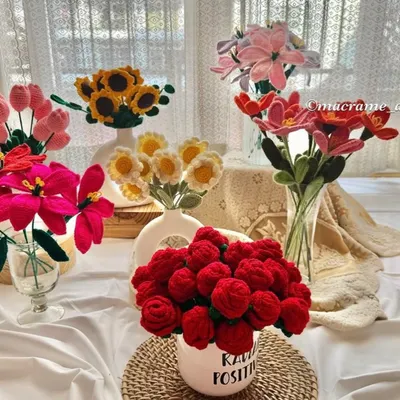 My collection of handmade crochet flowers, featuring red roses, bright sunflowers, and delicate lilies. These forever flowers are perfect for Valentine's Day, birthdays, or just because.