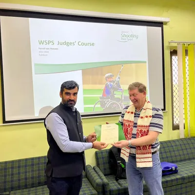 Here we are receiving our certificate after completing the World Para Shooting Sports Judges Course. This qualification is the foundation of our technical expertise.