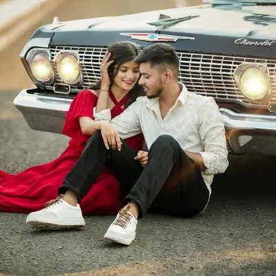 A classic love story with a vintage Chevrolet. The combination of the iconic car and the couple's romantic poses creates a timeless and cinematic pre-wedding photograph.