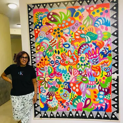 Standing proud next to the finished 'Freedom Mural.' This piece was a marathon of color and detail, completed in a single day with the help of a dear friend. It’s designed to radiate positive, free-flowing energy.