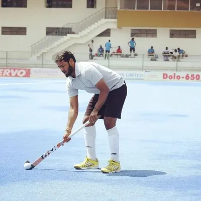 A player from our academy practicing on a blue turf field. We strive to provide our players with the best possible facilities and opportunities.