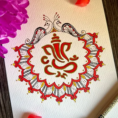 I started the year by creating this Ganesha mandala, a symbol of new beginnings. The design features Lord Ganesha surrounded by a decorative border with peacock motifs, all in auspicious red and yellow.