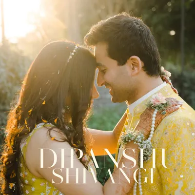A beautiful close-up of a couple during their Haldi ceremony, illuminated by the golden hour sun. This image is all about warmth, love, and the beautiful traditions of a wedding.