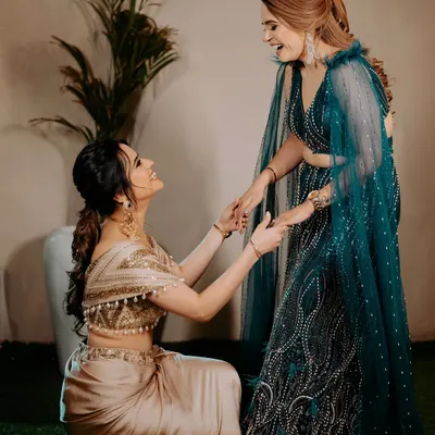A beautiful, candid moment between my sagan bride and her sister. Both are glowing with happiness.