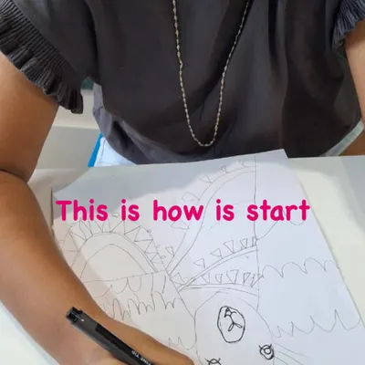 Every great artwork begins with the first line. Here, a student starts sketching the basic shapes of a festive llama, following our guided, step-by-step process.