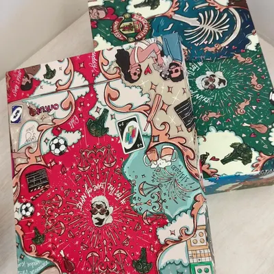 A look at the custom doodle art boxes I created as wedding return gifts for actress Keerthy Suresh. Each box tells the couple's story through unique illustrations, making it a deeply personal souvenir for guests.