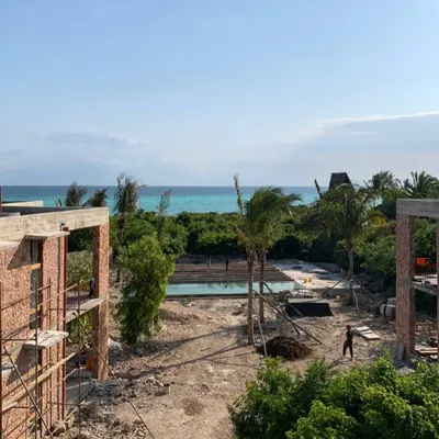 An aerial view of our Kizikula project in Zanzibar, showing the new structures taking shape around the pool. The design is oriented to capture the stunning views of the Indian Ocean and the surrounding tropical landscape.