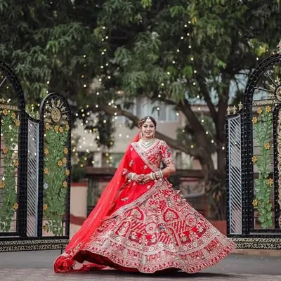 The quintessential bridal twirl in a stunning red lehenga. My focus here was on creating a luminous makeup look that felt fresh and radiant, even under the weight of traditional attire and a long day of ceremonies.