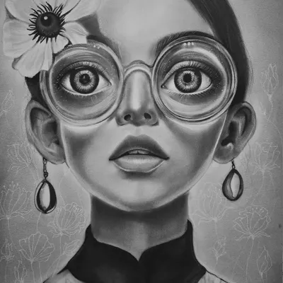 A finished charcoal portrait by our student Reeta. The piece showcases advanced skills in rendering realistic textures, reflections on the glasses, and capturing a captivating expression.