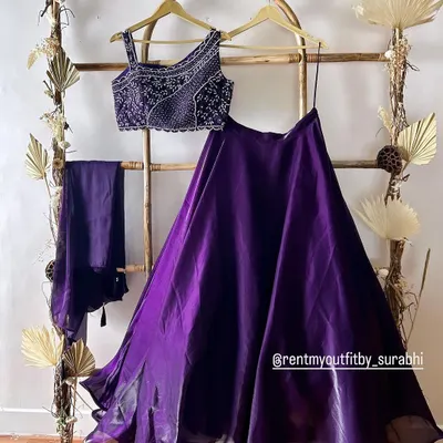 A beautiful purple organza lehenga with a heavily beaded blouse. This is part of my new Indo-Western collection available for rent.