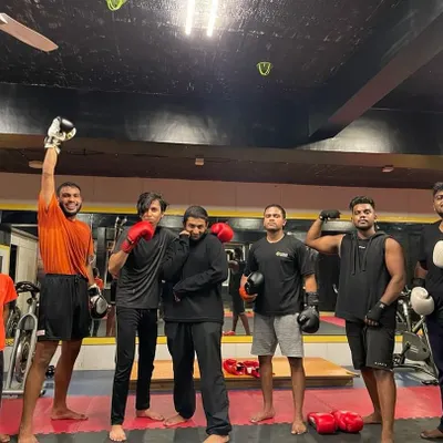 Teamwork makes the dream work. A great shot of the crew after a tough boxing session, including some of our younger members.