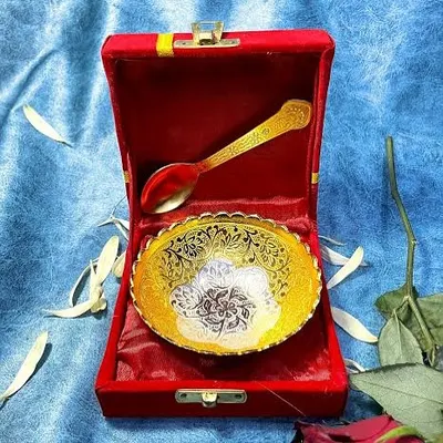 A single silver and gold plated bowl with a spoon, presented in a classic red velvet gift box. This is an ideal and budget-friendly option for large-scale corporate gifting during the festive season.