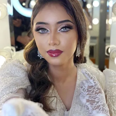 A stunning MET Gala-inspired look created by one of my expert trainers. This showcases the high-fashion artistry you can master, featuring a dramatic cut-crease, bold lips, and a flawless complexion.