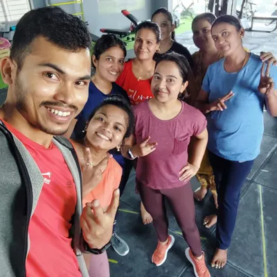 A happy, sweaty selfie with my fantastic group of ladies after a tough session. We build more than just muscle here; we build a strong, supportive fitness community.