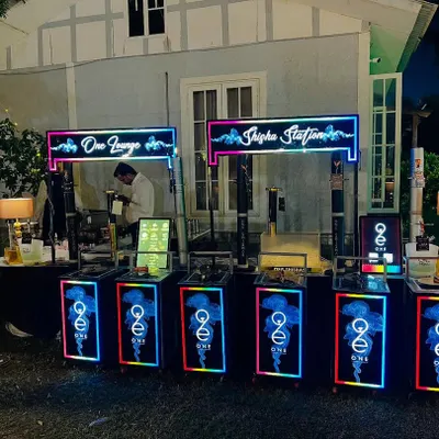 A full view of our "One Lounge" and "Shisha Station" setup, featuring modern LED counters that can be customized with different colors and effects.