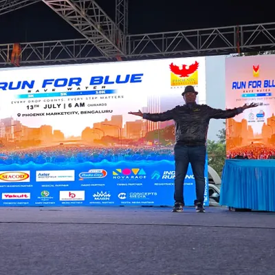 On stage at the "Run for Blue" marathon in Phoenix Marketcity. My setup includes a large LED screen for event branding and a sound system to energize thousands of runners.