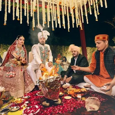 Bound by sacred vows, their journey as one begins amidst the holy flames of the havan kund. A traditional Pahadi wedding ceremony.