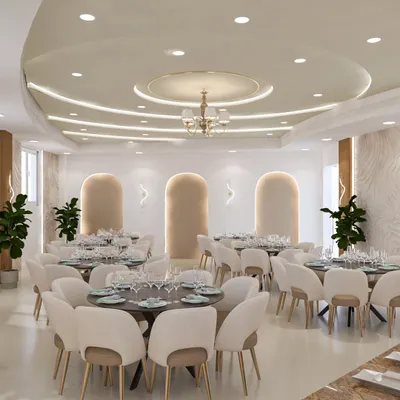 A view of the banquet hall showcasing the arched wall niches and clean, open layout. This design provides a sophisticated canvas that can be customized for weddings, corporate events, and other large gatherings.