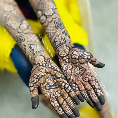 A perfect example of my fusion style. The bold, dark floral outlines are filled with delicate, traditional Pakistani patterns, creating a beautiful contrast.