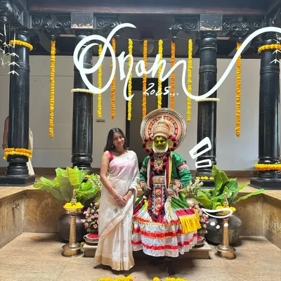 Celebrating Onam 2023. I added some elegant white script to this photo with a Kathakali dancer to mark the special occasion.