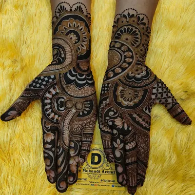 A beautiful example of a bold Arabic fusion design. This style is characterized by thick outlines, detailed shading, and open spaces, creating a very striking look.