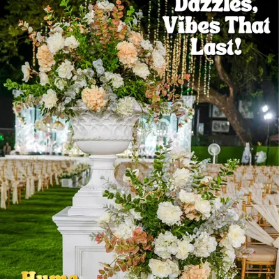 Before the food wins hearts, the decor sets the mood. This beautiful floral arrangement on a lawn is an example of the dazzling and vibrant setups I provide for outdoor events.
