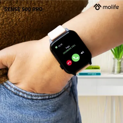 This lifestyle shot for a smartwatch brand demonstrates its call-receiving feature. The watch is shown on a wrist with a casual denim background, making the technology feel accessible and part of daily life.
