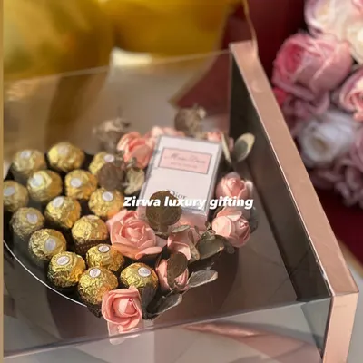 Celebrate love with elegance. This newly launched luxury Valentine's hamper features a heart-shaped box of Ferrero Rocher chocolates and Miss Dior perfume, all encased in a stunning rose gold acrylic box.