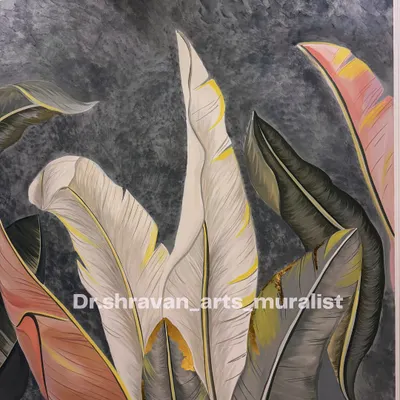 This mural features large tropical leaves in a sophisticated greyscale palette with hints of color and gold. It's a modern take on botanical art that adds a sense of calm and nature to an interior space.