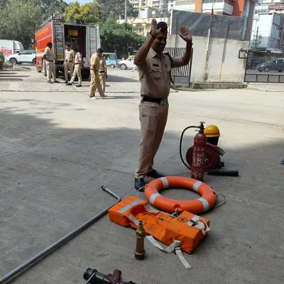 A day at the fire station. A firefighter demonstrates the equipment they use, providing a real-world connection to our lessons on community helpers.