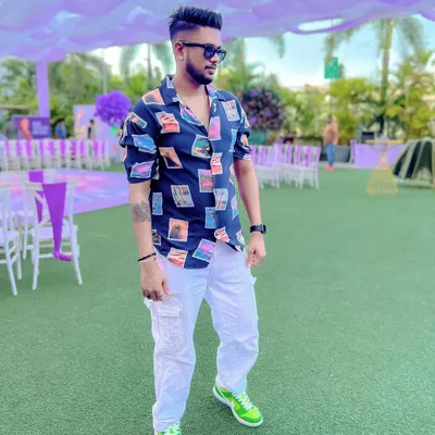 Dressed for a wedding carnival in Nashik. I match my style to your event's theme, bringing a cool, relaxed vibe for daytime parties and poolside celebrations.