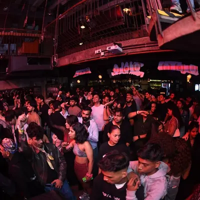 A wide shot of the packed house at The Grind. Every Saturday, Khar Social turns into a family reunion for hip-hop heads.