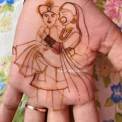 The first step in creating a portrait. This is the clean, confident outline of a groom carrying his bride, which serves as the foundation for the detailed work to follow.