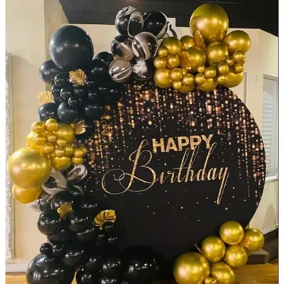 A chic and elegant black and gold circular backdrop with a 'Happy Birthday' sign, perfect for a sophisticated celebration.