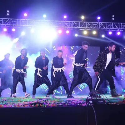 On stage, in the spotlight. This is a glimpse of a professional stage show, showcasing a dynamic group performance with full lighting and effects. I choreograph for events of all scales. 💫
