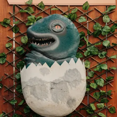Welcome to the land of dinosaurs! This hatching dinosaur egg prop was a huge hit at our Jurassic Park-themed party, adding a touch of thrilling realism.