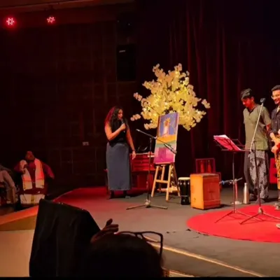 On stage at TEDx IIM Bangalore, sharing my thoughts on art and sustainability while painting. Performing live allows me to combine my passion for speaking and creating, engaging the audience in a multi-sensory experience.