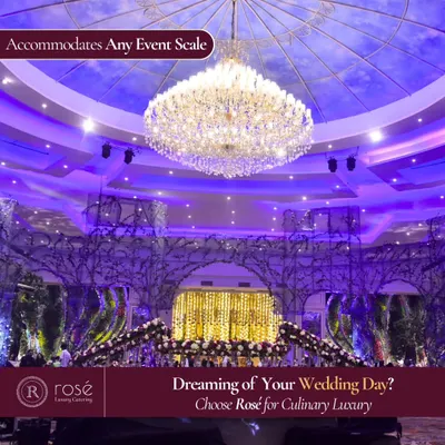 A breathtaking view of a grand wedding venue we catered. The magnificent chandelier and lavish decor show that we can accommodate any event scale, from intimate gatherings to the most opulent celebrations.