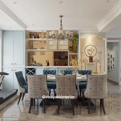 This design seamlessly integrates a pooja unit into the dining area. The elegant niche with an 'Om' symbol and traditional lamps provides a divine focal point without disrupting the modern aesthetic of the space.