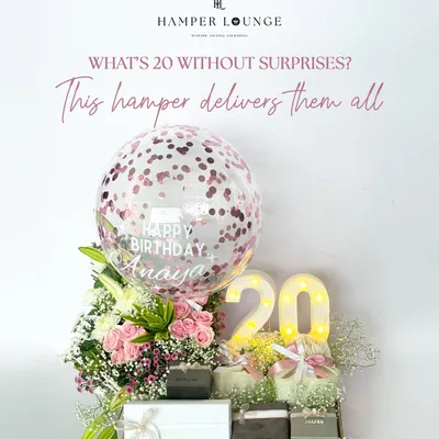 Turning 20 is a big deal, and this hamper was designed to capture all that excitement. It features a light-up "20", a personalized confetti balloon for Anaya, fresh pink roses, and boxes of curated surprises to start her new decade in style.