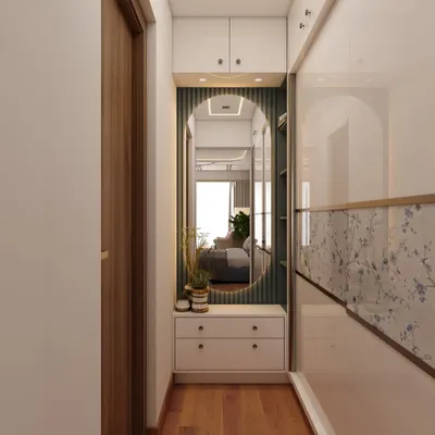 This hallway features a beautiful wardrobe with glossy floral-detailed sliding doors. The design includes a built-in vanity with an oval mirror and drawers, making it a stylish and functional dressing area.