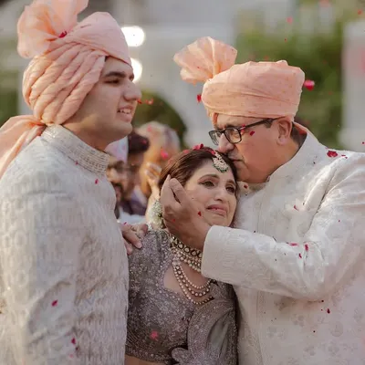 A father's love and a mother's pride. This tearful, loving moment during the Varmala is what wedding photography is all about for me.