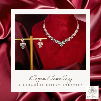 This diamond and emerald necklace set is designed to mesmerize. The necklace features a cascade of heart-shaped emeralds, each haloed by brilliant diamonds, creating a look of classic elegance. The matching earrings complete the set, perfect for making a signature statement at any formal event.