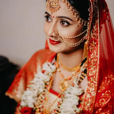 This was me on my wedding day, wearing a nose ring and matha patti from my own collection. It was so important for me to blend family tradition with my personal style, and these pieces helped me do just that.